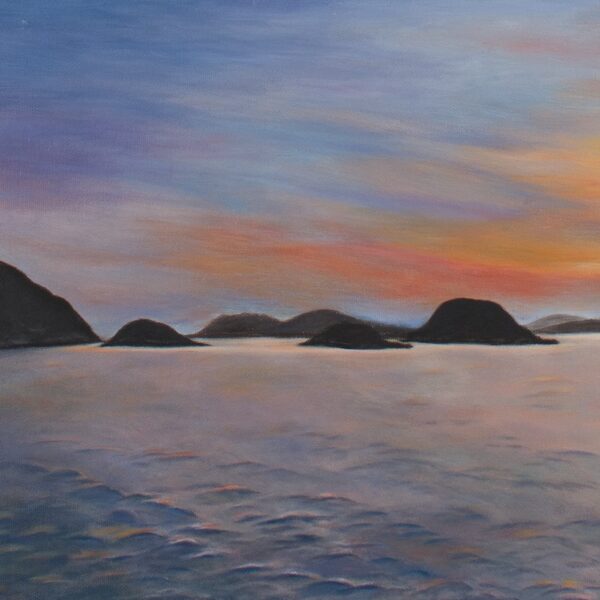 The art print Twilight at South Bay beautifully portrays a calm ocean at sunset, with a sky of soft pink, orange, and blue hues. Silhouetted islands in the distance are reflected in the tranquil waters below.