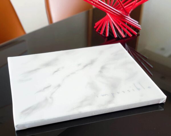 black and white marble resin art print on table