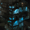 This art print, Sham Shui Po, captures a dimly lit high-rise with an external staircase. Each landing glows blue, highlighting a solitary figure and evoking poignant solitude in urban life.