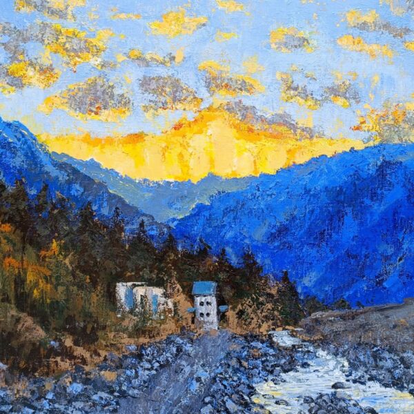 The product Blue Mountains is a vibrant oil painting art print showing a sunrise mountainous landscape. It features blue mountains encircling a green-roofed house among trees, with a rocky path and river leading to the house under golden cloud-filled sky.