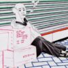 A person sits against stacked boxes labeled Simple Taste 05 on blue-tiled pavement, a thoughtful smoke cloud hovering above. With their hand on their face, they resemble an art print in contemplation as a corrugated door creates a textured backdrop.