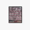 Framed art print titled Composite Building depicts a tall, densely packed apartment building with balconies filled with various items. A red car adds a pop of color in front. The black frame contrasts beautifully with the white background, enhancing the urban vibe.