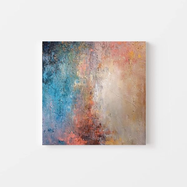 The art print Ashes of Time I is an abstract canvas with a blended gradient of blue, pink, orange, and beige hues. Its rough texture enhances depth and movement in the color transitions.