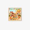 The art print Children Smile features two kids and a cat on the floor, surrounded by toys and books in a bright room. Festival flags hang above, sunlight illuminates the scene, and a toy train sits on a shelf, infusing charm into this vibrant setting.