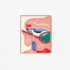 The cherry thief art print showcases a face in profile with a prominent eye, colorful patterns, an ant, cherry, and blue tag. Vibrant hues of red, blue, pink, and black stand out against the white background in a gold frame.