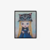 The Alice in Matrix framed art print features a girl with large eyes, long blonde hair, and a blue dress. Her outstretched hands appear below a large cat face with striking blue eyes that blend into her hair against a gradient background.