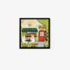 The art print Cafe Outside captures two rabbit-like creatures seated at a table outside a quaint cafe with a green striped awning, red door, and Luvi cafe sign, all surrounded by lush greenery and flowers.