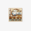 Cafe Inside art print portrays a cozy scene featuring a counter with three stools and a cone-headed character serving coffee, surrounded by warm hues, hanging lamps, and vintage equipment for an inviting ambiance.