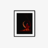 Framed art print titled The Sun, the Fire, the Blood, featuring a dark abstract image with a fiery red figure at its center, surrounded by flame-like or smoky flowing lines against a black backdrop.