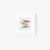 The Jelly Candy art print showcases three vibrantly colored red, orange, and green candies against a white textured background. It comes in a white square frame, providing a playful splash of color to any room.