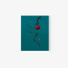 The Eternity art print features a red apple wrapped in a long, twisting ribbon surrounded by gold sparkles on a teal background, with a white frame that enhances its whimsical and magical look.
