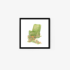 The Hidden Place art print showcases a framed artwork of a green armchair adorned with floral patterns, surrounded by scattered colorful flowers on the ground, all against a plain white background.