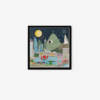 Framed cityscape illustration with skyscrapers, a suspension bridge, and water beneath a large green one-eyed creature hovering above. A full moon and stars enhance this enchanting piece titled Toys.