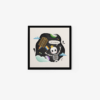 The Hello World framed art print features a playful skeleton with a yellow crown, surrounded by colorful planets and clouds against a dark, starry background. It holds a sign reading Hello World, with a vibrant floating door nearby.