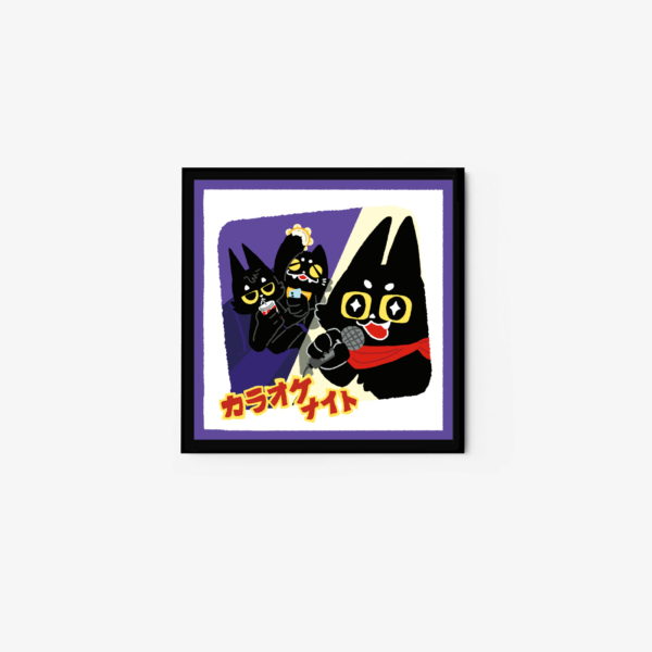 This art print titled Karaoke Night features three cartoon cats singing. The central cat with a red scarf holds a mic, while the others stand in the background with their own mics. Japanese text reads カラオケナイト, enhancing this vibrant and charming scene.