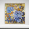 The Ethereal Bloom II, 2024 is a framed painting for home with soft blue flowers against a vibrant golden and amber background, blending abstract and floral elements for depth and movement.